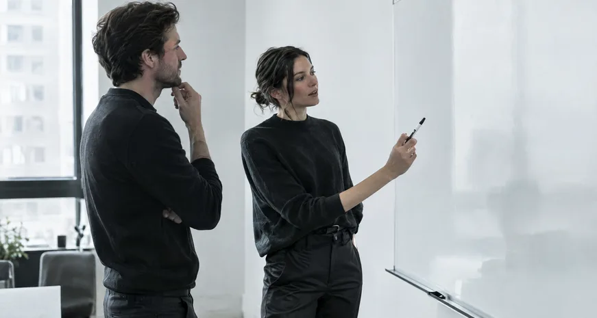 Founders at a whiteboard